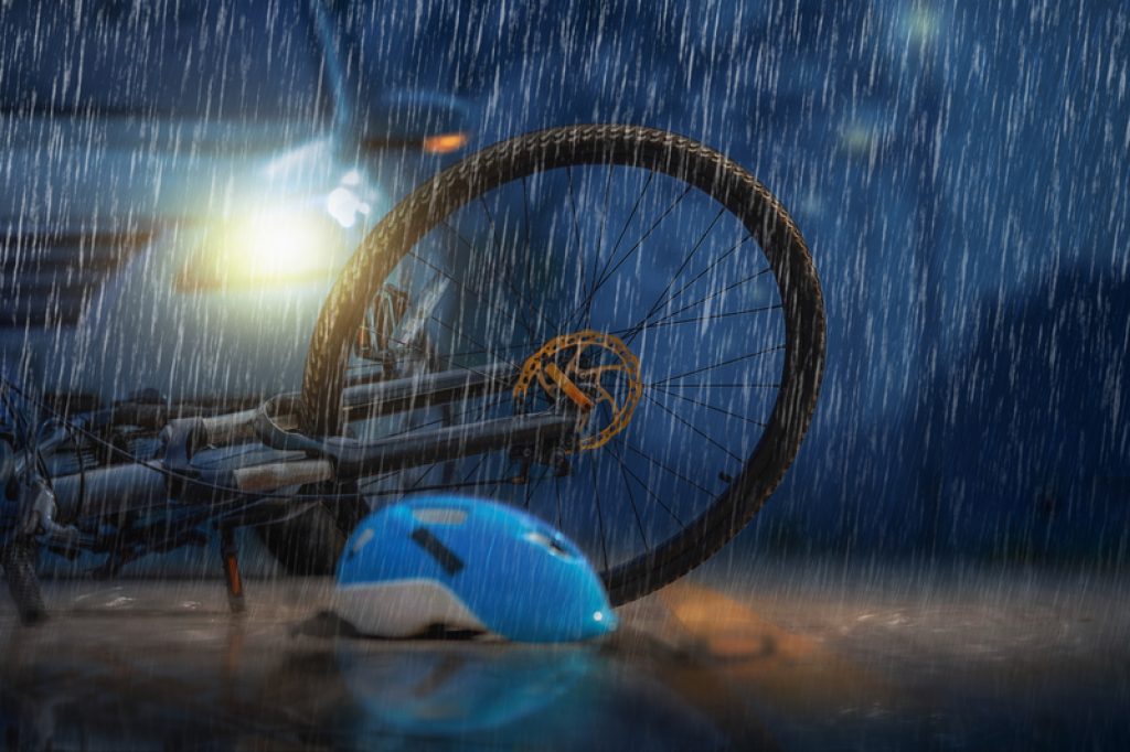 dreamstime_s_117418161-night-rain-bicycle-crash-stock-photo