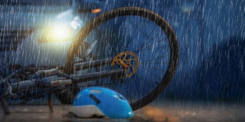 dreamstime_s_117418161-night-rain-bicycle-crash-stock-photo